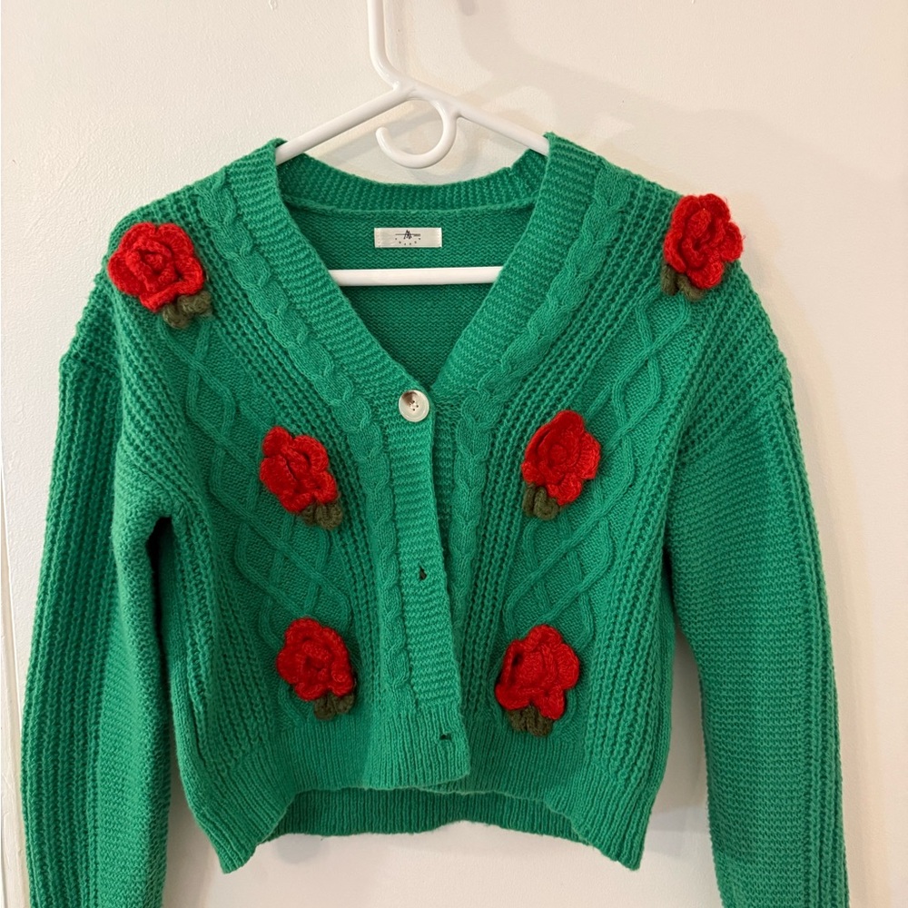Vibrant Green Cardigan with Red Floral Accents